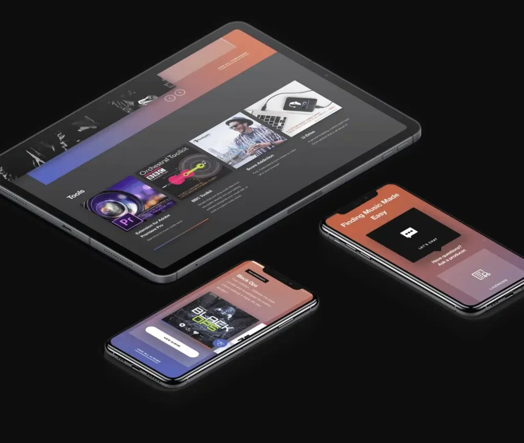 Tablet and smartphones displaying a music app interface on black background.